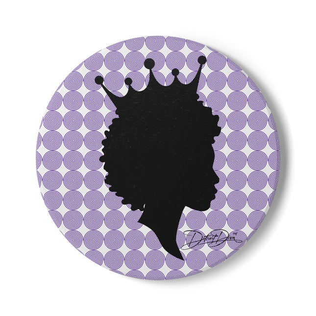 Round coaster with black silhouette of a woman with a crown on a purple and white circular patterned background.