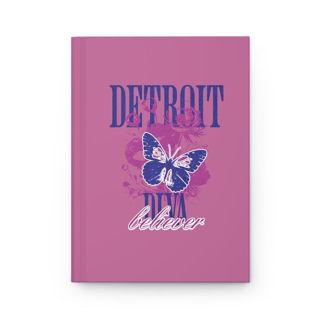 Pink journal or notebook with butterfly design and text on a white background