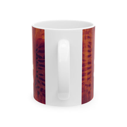 White mug with brown abstract pattern on a white background