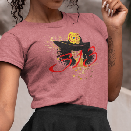 Woman wearing a pink t-shirt with a graphic design of a church hat and the area code 313.