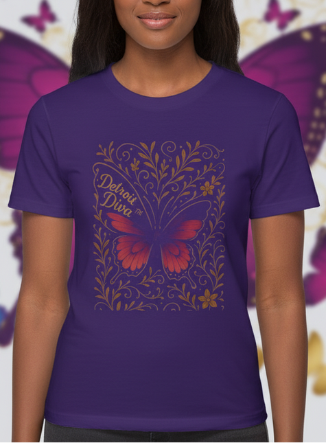 Woman wearing a purple t-shirt with butterfly design and text, standing against a colorful butterfly background.