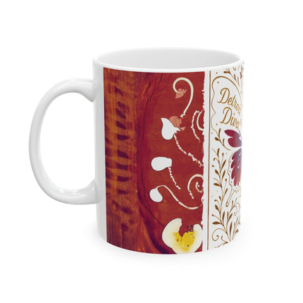 White mug with decorative red and white pattern on a white background