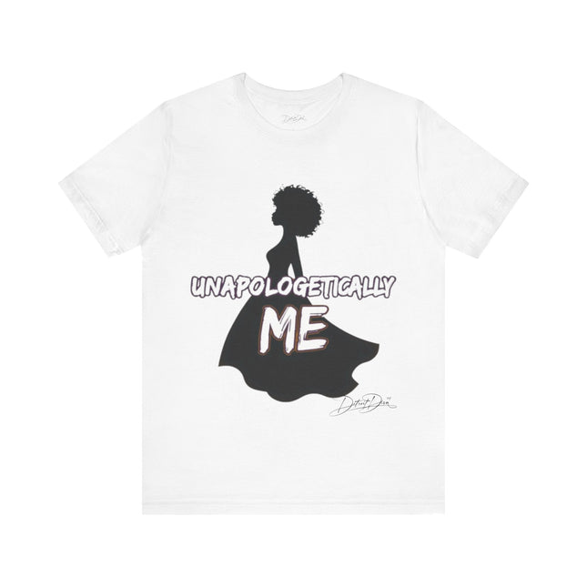White t-shirt with black silhouette of a woman and 'UNAPOLOGETICALLY ME' text on a white background