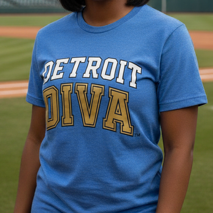 Woman wearing a blue 'Detroit Diva' t-shirt on a baseball field