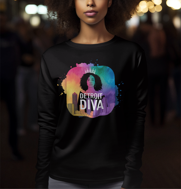Woman wearing a black sweatshirt with 'Detroit Diva' design in a colorful circle.